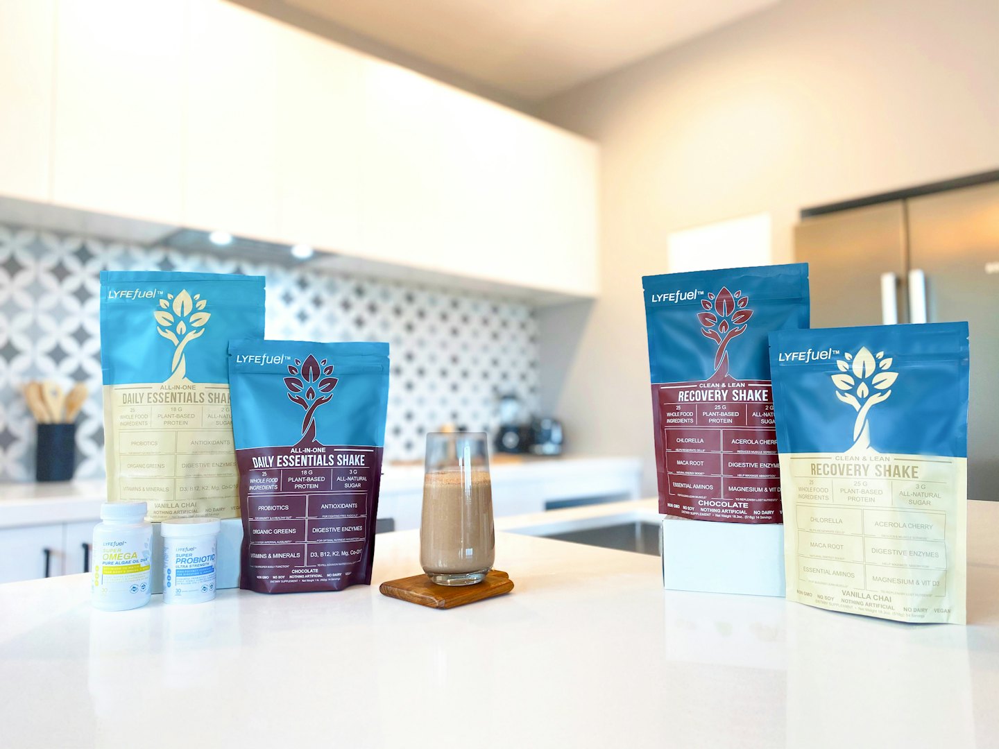 LYFEfuel protein supplements and a prepared shake on a kitchen counter.